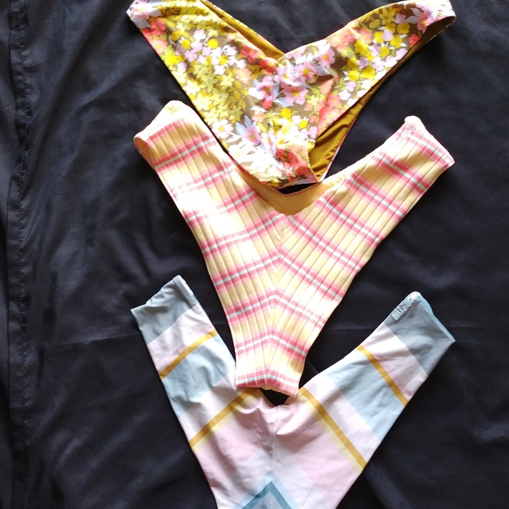 bathing suit bottoms and one top